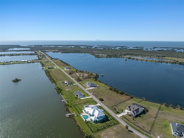 drone / aerial view featuring a water view