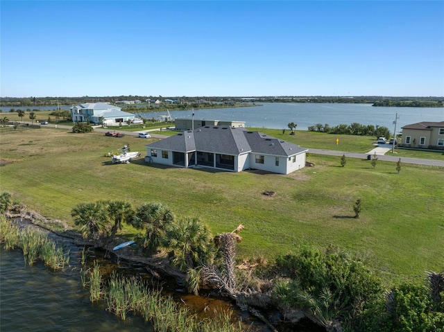 bird's eye view with a water view