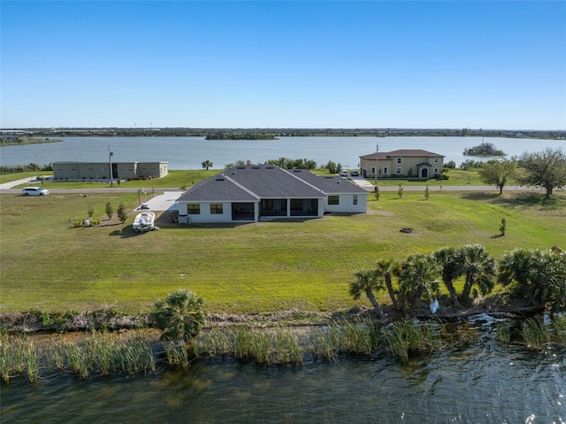 drone / aerial view featuring a water view