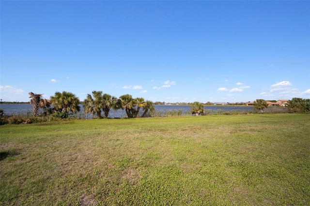 view of yard with a water view