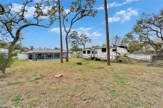 4118 Ramona Dr, Spring Hill, FL 34606 - fenced backyard featuring a lanai