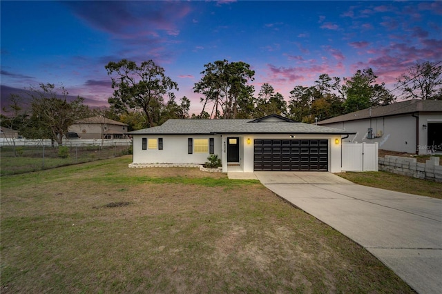 4118 Ramona Dr, Spring Hill, FL 34606 - view of front facade with a garage and concrete driveway