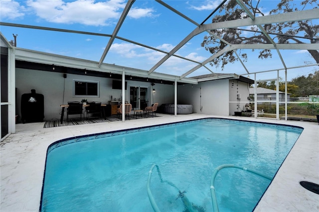 4118 Ramona Dr, Spring Hill, FL 34606 - outdoor pool featuring glass enclosure and a patio
