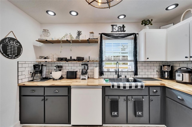 4118 Ramona Dr, Spring Hill, FL 34606 - kitchen with butcher block countertops, decorative backsplash, gray cabinets, open shelves, and recessed lighting