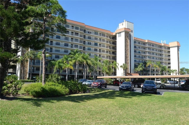 view of property with covered parking