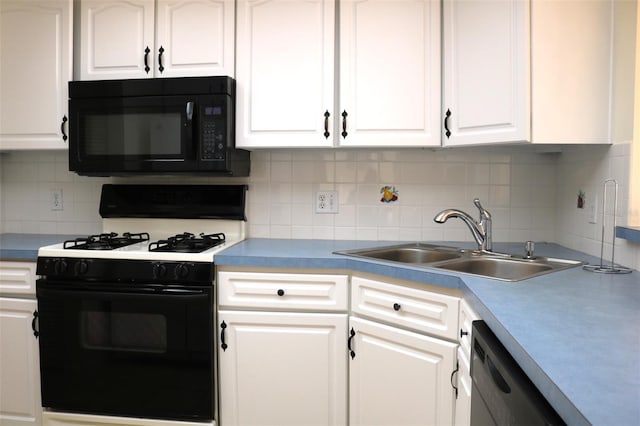 kitchen featuring dishwashing machine, white cabinetry, a sink, black microwave, and range with gas cooktop