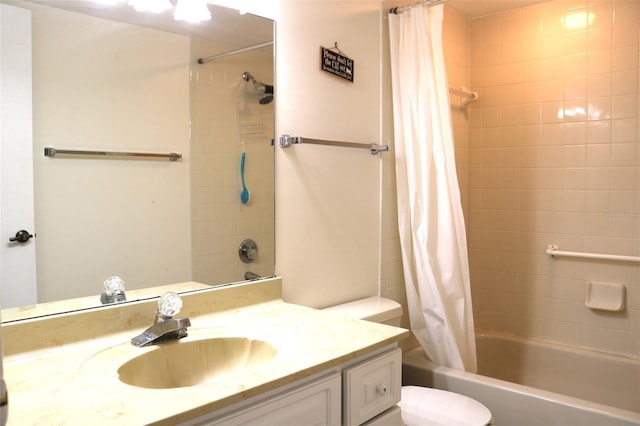 bathroom featuring vanity, toilet, and shower / bath combo with shower curtain