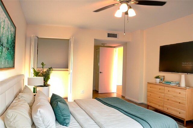 5400 Park St N Unit 200, Saint Petersburg, FL 33709 - bedroom with a ceiling fan, baseboards, and visible vents