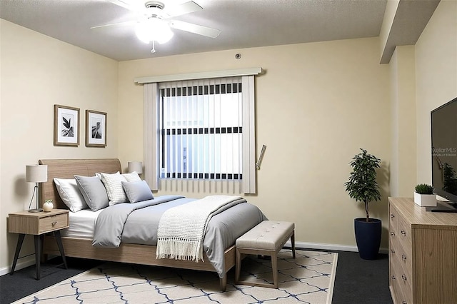 5400 Park St N Unit 200, Saint Petersburg, FL 33709 - bedroom featuring baseboards, carpet floors, and a ceiling fan