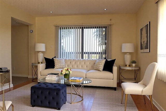 5400 Park St N Unit 200, Saint Petersburg, FL 33709 - living room featuring hardwood / wood-style floors, baseboards, and recessed lighting