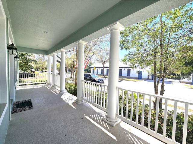 balcony featuring a porch