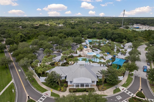 aerial view featuring a view of trees