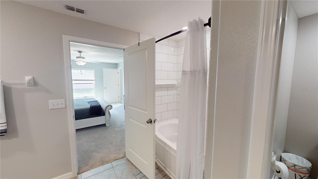 10115 Paradise Fish Dr, Riverview, FL 33578 - ensuite bathroom featuring visible vents, a ceiling fan, ensuite bathroom, shower / tub combo, and tile patterned flooring