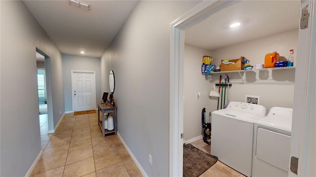 10115 Paradise Fish Dr, Riverview, FL 33578 - laundry area with visible vents, baseboards, laundry area, light tile patterned flooring, and washer and dryer