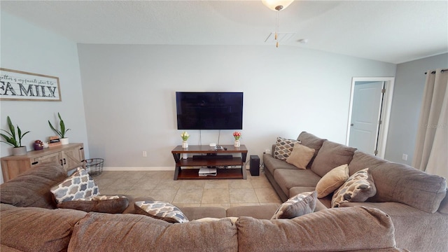 10115 Paradise Fish Dr, Riverview, FL 33578 - living room featuring light tile patterned floors, baseboards, and lofted ceiling
