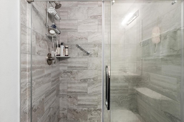 bathroom featuring a shower stall