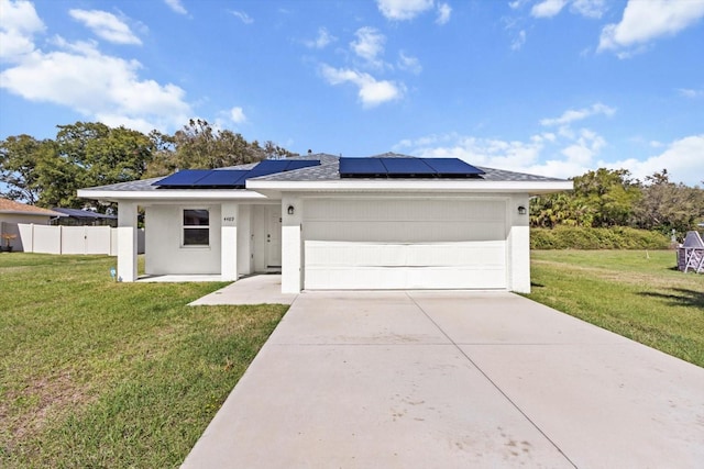 single story home featuring a front yard, concrete driveway, an attached garage, and stucco siding