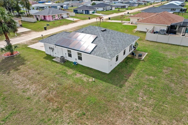 birds eye view of property with a residential view