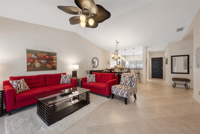 living area featuring vaulted ceiling, light tile patterned flooring, ceiling fan with notable chandelier, and visible vents