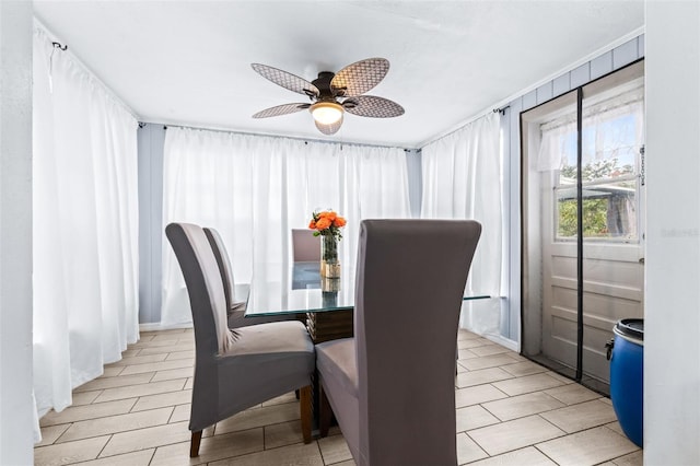 dining space featuring a ceiling fan