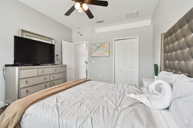 bedroom featuring a ceiling fan, a closet, and visible vents