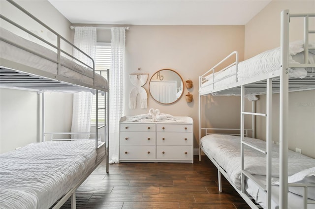 bedroom with wood finished floors