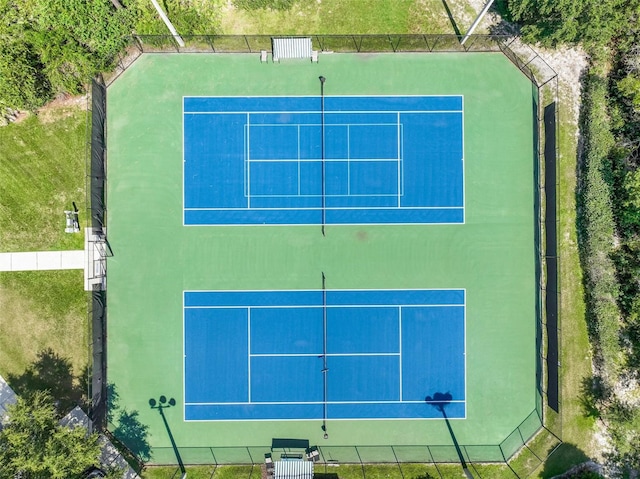 view of sport court with fence