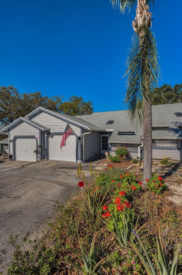 view of front of property with an attached garage and driveway