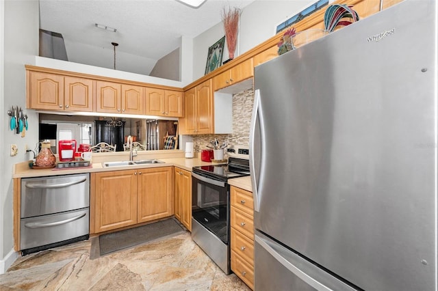 kitchen with light countertops, a sink, tasteful backsplash, a warming drawer, and appliances with stainless steel finishes