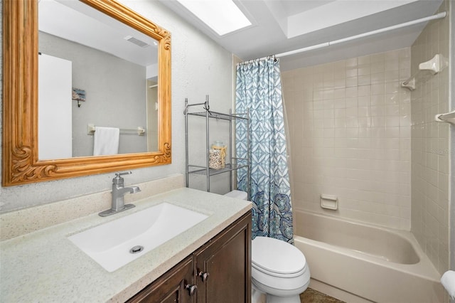 bathroom featuring shower / bath combination with curtain, toilet, vanity, and visible vents