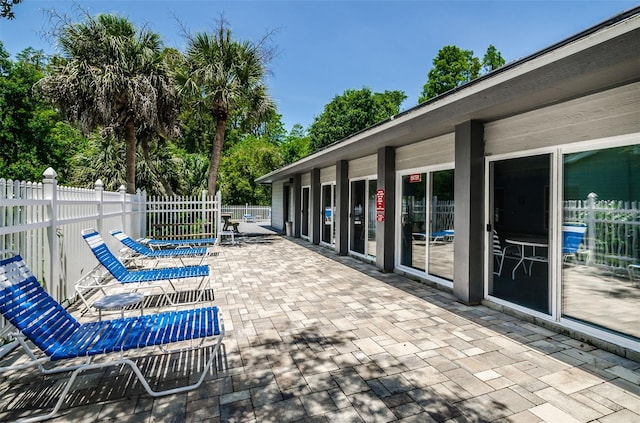 view of patio / terrace featuring fence