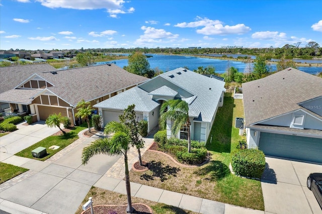 drone / aerial view featuring a water view