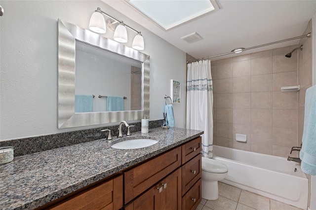 full bath featuring visible vents, toilet, tile patterned floors, shower / bath combination with curtain, and vanity