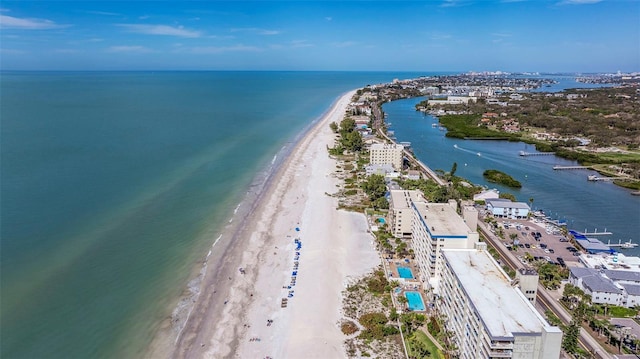 bird's eye view featuring a beach view and a water view