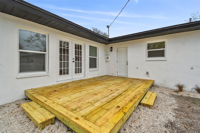 wooden terrace featuring french doors