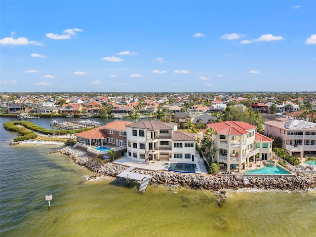 aerial view with a water view and a residential view