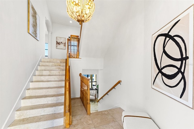 stairway featuring a notable chandelier and tile patterned flooring