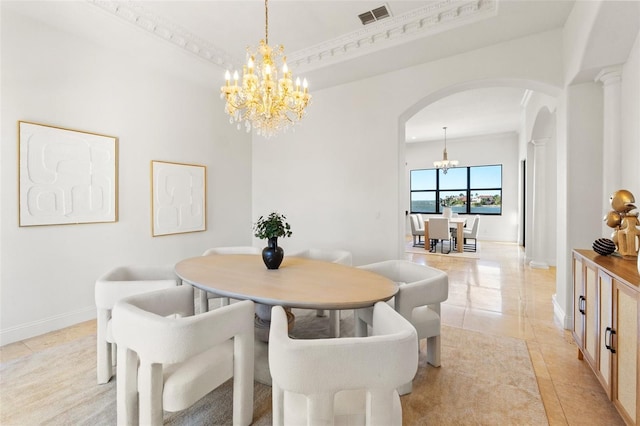 dining area featuring visible vents, baseboards, a tray ceiling, an inviting chandelier, and arched walkways