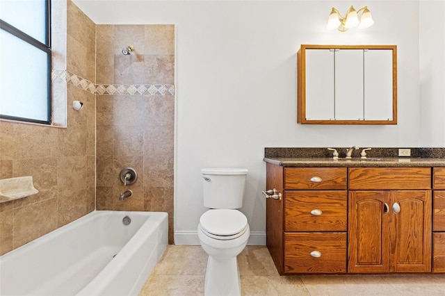 bathroom with toilet, tile patterned flooring, tub / shower combination, baseboards, and vanity