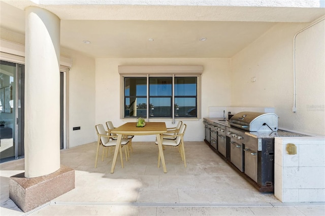 view of patio featuring outdoor dining area and area for grilling