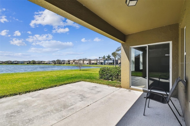 view of patio / terrace with a water view