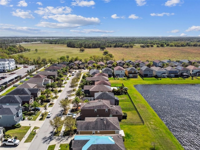 bird's eye view with a residential view and a water view