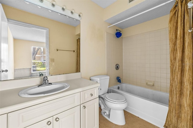 full bath with toilet, tile patterned flooring, shower / washtub combination, and vanity