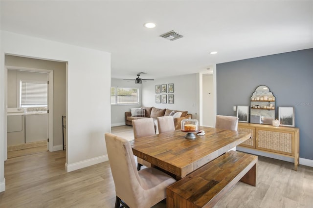 dining room featuring light wood-type flooring, visible vents, baseboards, and recessed lighting