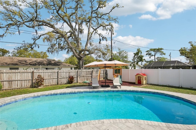 view of pool featuring a fenced in pool and a fenced backyard