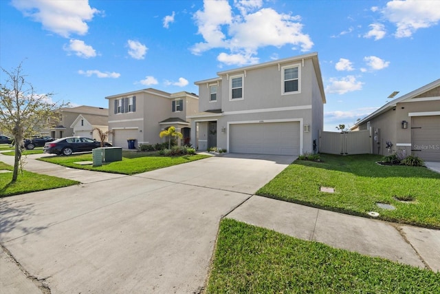 traditional home with a garage, driveway, a residential view, and a front yard