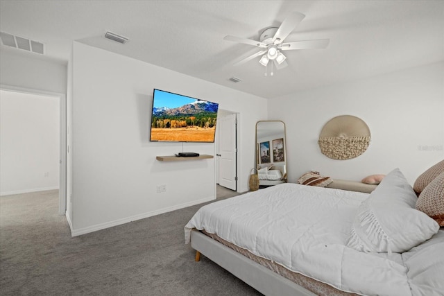 carpeted bedroom featuring a ceiling fan, visible vents, and baseboards