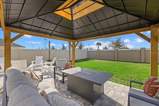 view of patio / terrace with an outdoor hangout area, a gazebo, and a fenced backyard