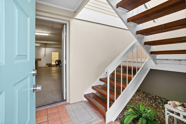 stairs featuring tile patterned flooring