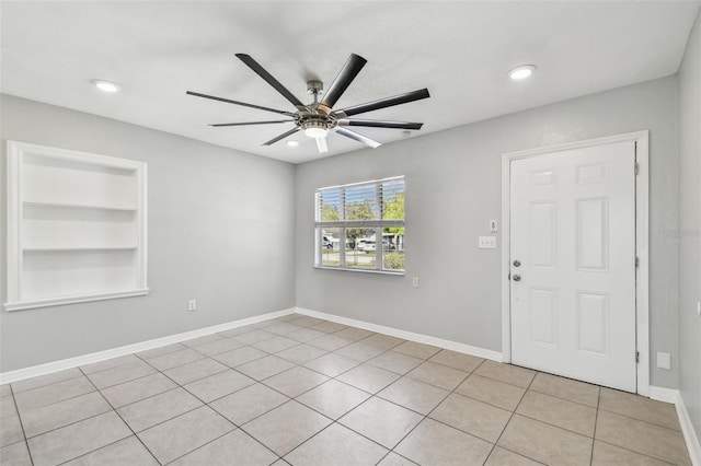 spare room with ceiling fan, recessed lighting, baseboards, and built in features